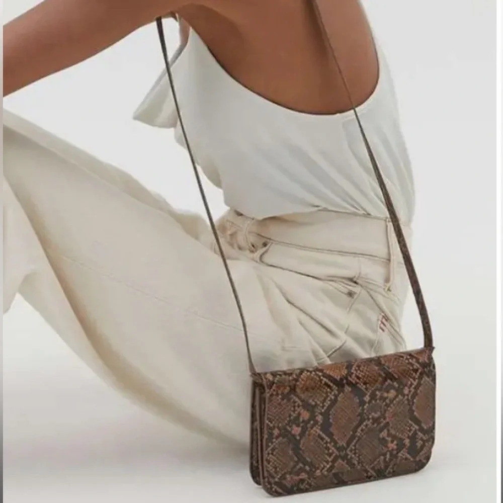 Urban Outfitters Crossbody faux snakeskin bag